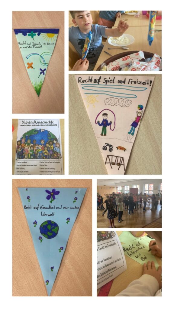 Wimpel die von Kindern bemalt worden sind.